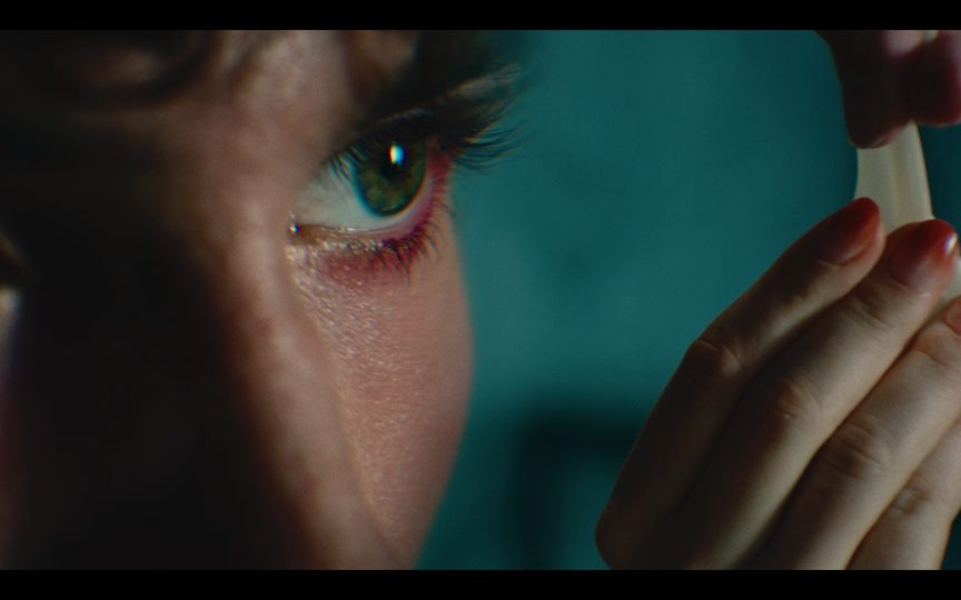 Film still: hands with fabric