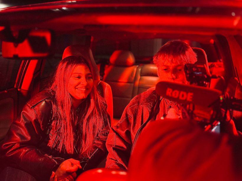 Behind the scenes in a red-lit car