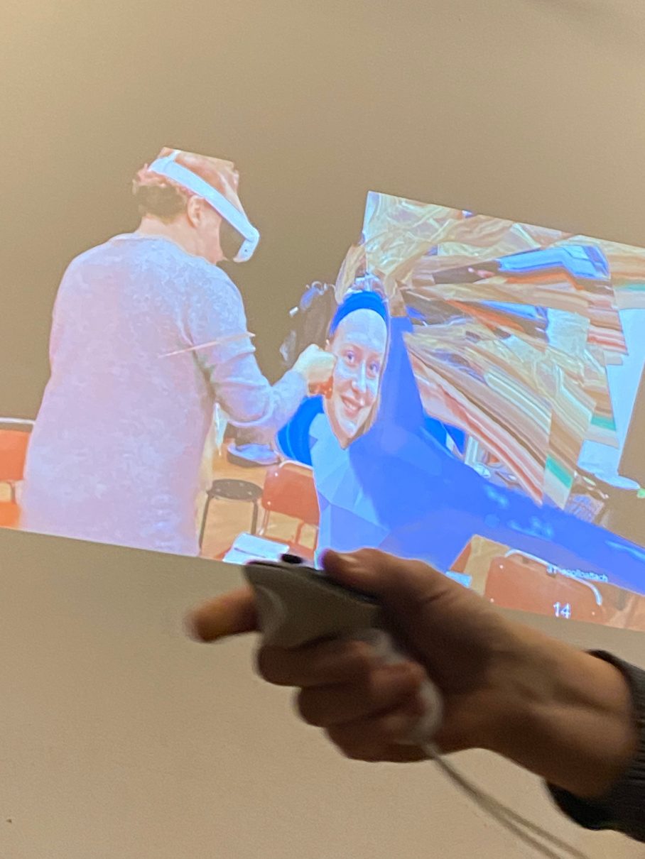 Hand holding an AR tablet