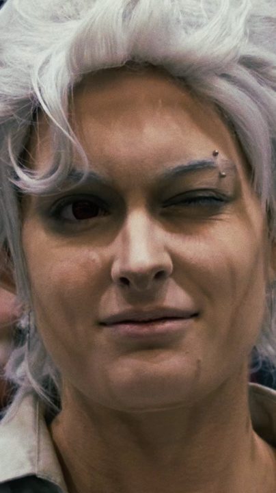Cosplayer close-up, winking